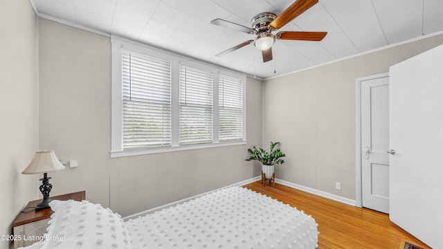 1910 Alfresco Pl, Louisville, KY 40205 - bedroom with wood finished floors, crown molding, and a ceiling fan