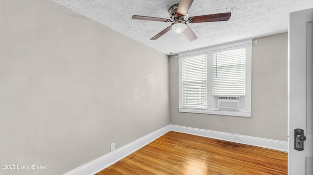 1910 Alfresco Pl, Louisville, KY 40205 - unfurnished room featuring a textured ceiling, ceiling fan, wood finished floors, and cooling unit