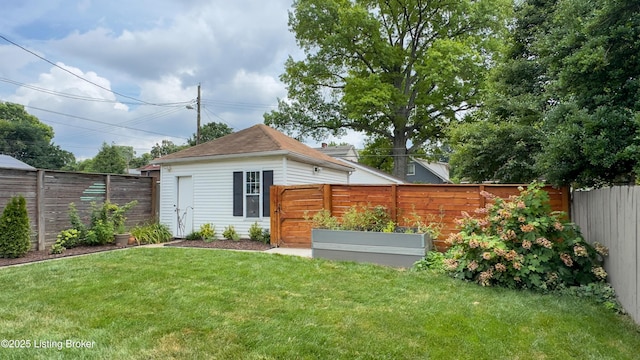 1910 Alfresco Pl, Louisville, KY 40205 - rear view of property featuring a vegetable garden and a fenced backyard