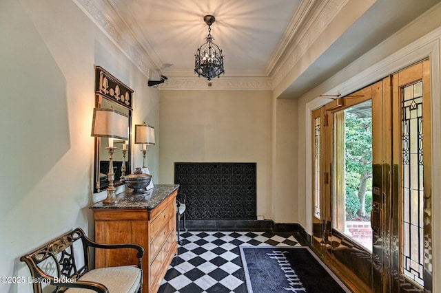 1416 Willow Ave Unit 3B, Louisville, KY 40204 - foyer entrance with dark flooring, ornamental molding, and a chandelier