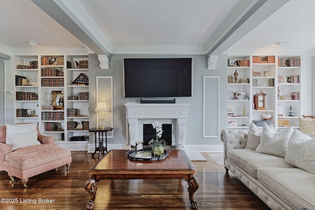 1416 Willow Ave Unit 3B, Louisville, KY 40204 - living area with ornamental molding, wood finished floors, built in shelves, and a fireplace with flush hearth
