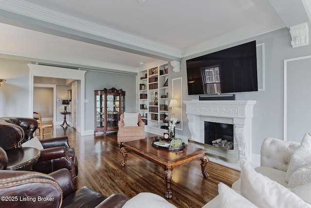 1416 Willow Ave Unit 3B, Louisville, KY 40204 - living area with built in shelves, wood finished floors, a high end fireplace, and crown molding
