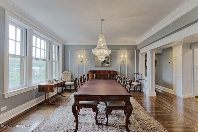 1416 Willow Ave Unit 3B, Louisville, KY 40204 - dining area featuring dark wood finished floors, a chandelier, and ornamental molding