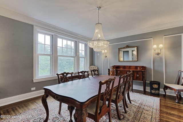 1416 Willow Ave Unit 3B, Louisville, KY 40204 - dining room featuring a chandelier, wood finished floors, and crown molding