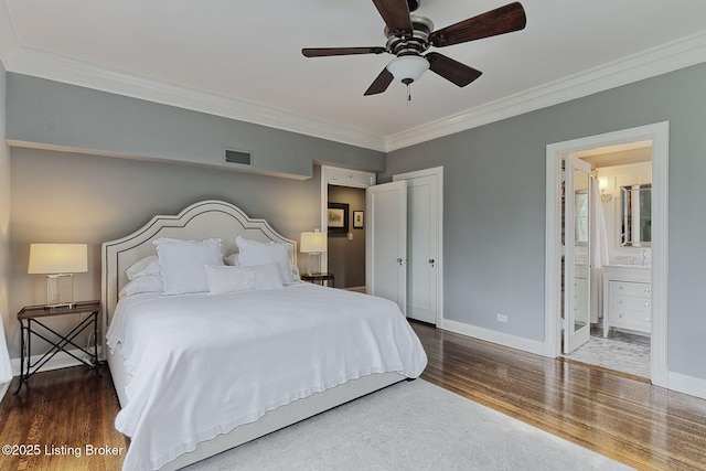 1416 Willow Ave Unit 3B, Louisville, KY 40204 - bedroom featuring wood finished floors, ornamental molding, ensuite bath, and ceiling fan