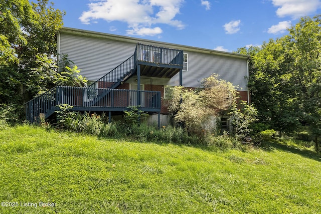 363 S Deepwood Dr, Radcliff, KY 40160 - back of house featuring brick siding, a deck, and a balcony