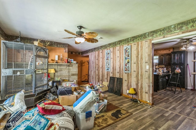 363 S Deepwood Dr, Radcliff, KY 40160 - living area with a ceiling fan, wood finished floors, and wooden walls