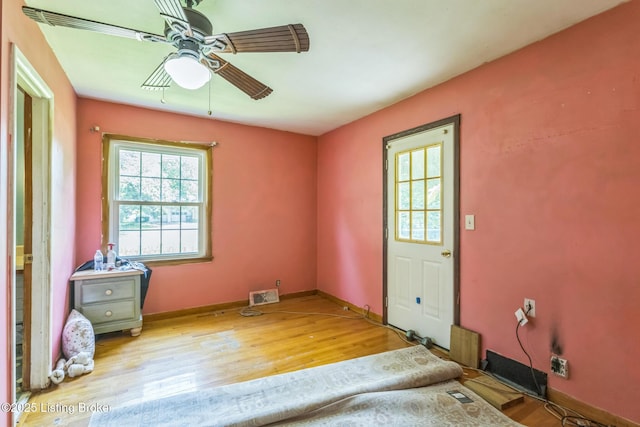 363 S Deepwood Dr, Radcliff, KY 40160 - empty room with wood finished floors and ceiling fan
