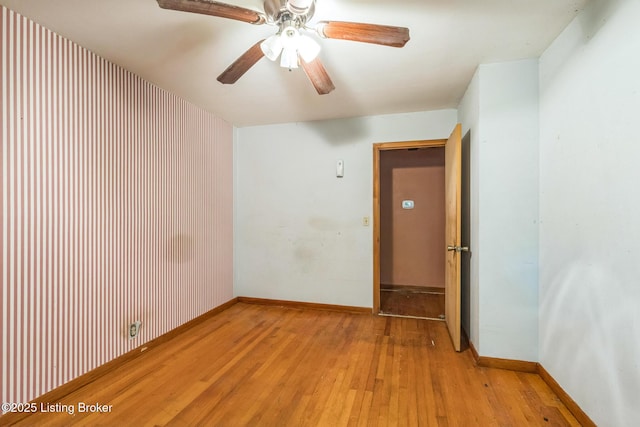 363 S Deepwood Dr, Radcliff, KY 40160 - empty room with light wood-style floors and a ceiling fan