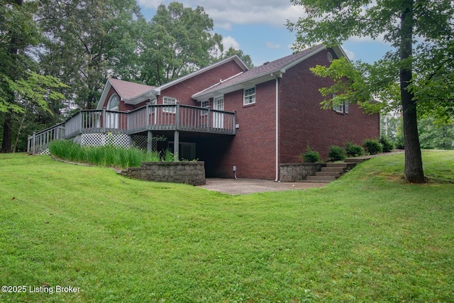 236 Bobwhite Rd, Brandenburg, KY 40108 - rear view of property with brick siding, a deck, a yard, and a patio area