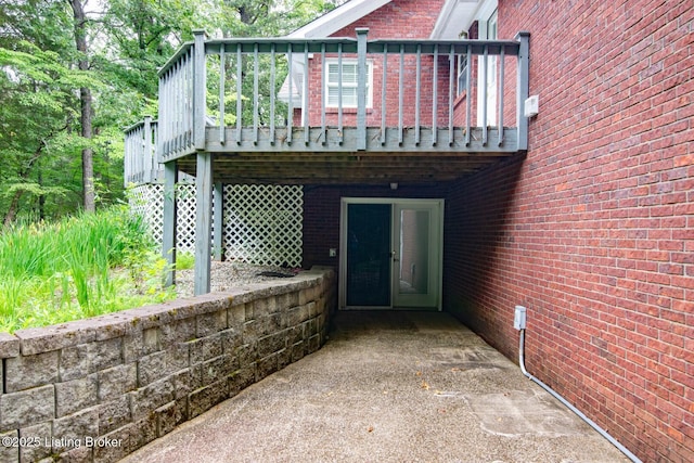 236 Bobwhite Rd, Brandenburg, KY 40108 - back of house featuring brick siding and a deck