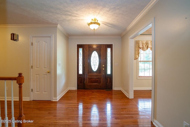236 Bobwhite Rd, Brandenburg, KY 40108 - foyer entrance with wood finished floors, a textured ceiling, and ornamental molding