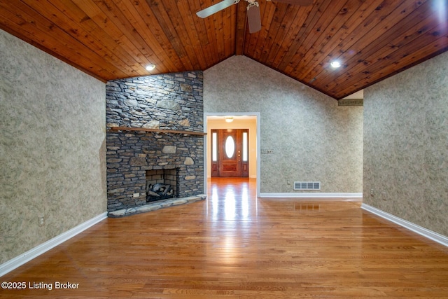 236 Bobwhite Rd, Brandenburg, KY 40108 - unfurnished living room with lofted ceiling, wood finished floors, a ceiling fan, wood ceiling, and a fireplace