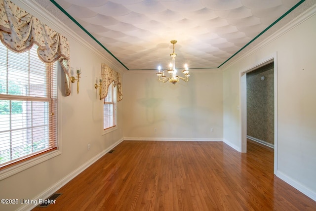 236 Bobwhite Rd, Brandenburg, KY 40108 - unfurnished room with ornamental molding, a chandelier, and wood finished floors