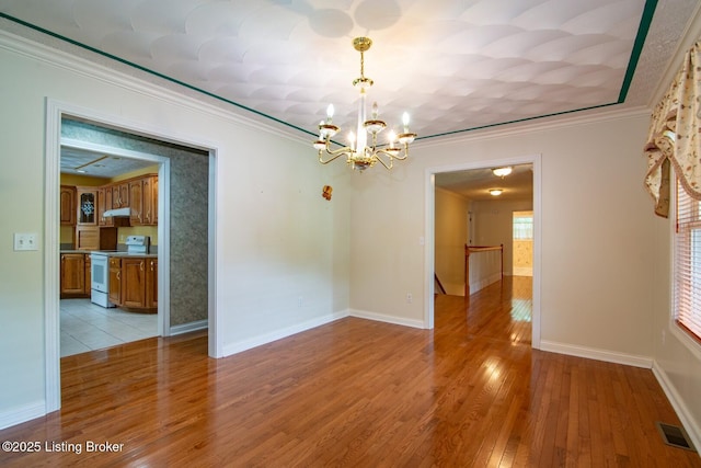 236 Bobwhite Rd, Brandenburg, KY 40108 - unfurnished room with a chandelier, light wood-type flooring, and ornamental molding