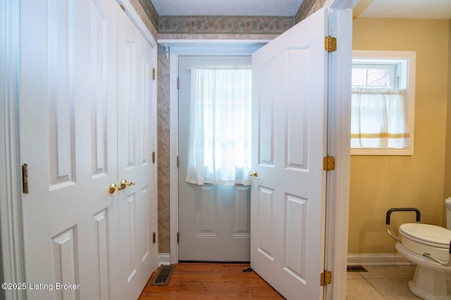 236 Bobwhite Rd, Brandenburg, KY 40108 - doorway to outside featuring baseboards