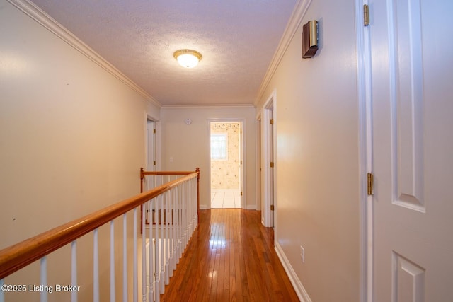 236 Bobwhite Rd, Brandenburg, KY 40108 - hall with a textured ceiling, an upstairs landing, crown molding, and hardwood / wood-style flooring