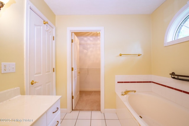236 Bobwhite Rd, Brandenburg, KY 40108 - bathroom with vanity, a garden tub, tile patterned floors, and a walk in closet