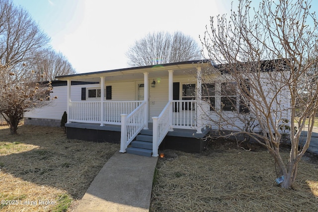 43 Mcfarlin Ln, Vine Grove, KY 40175 - view of front of house featuring a porch