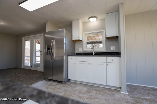 43 Mcfarlin Ln, Vine Grove, KY 40175 - kitchen with stainless steel refrigerator with ice dispenser and white cabinets