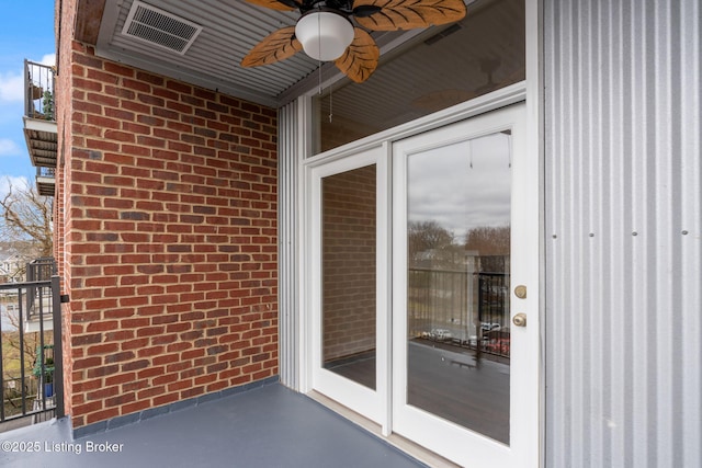 2011 Frankfort Ave Unit Unit312, Louisville, KY 40206 - doorway to property with ceiling fan and brick siding