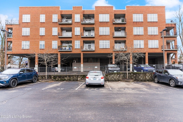 2011 Frankfort Ave Unit Unit312, Louisville, KY 40206 - view of apartment building / complex with uncovered parking