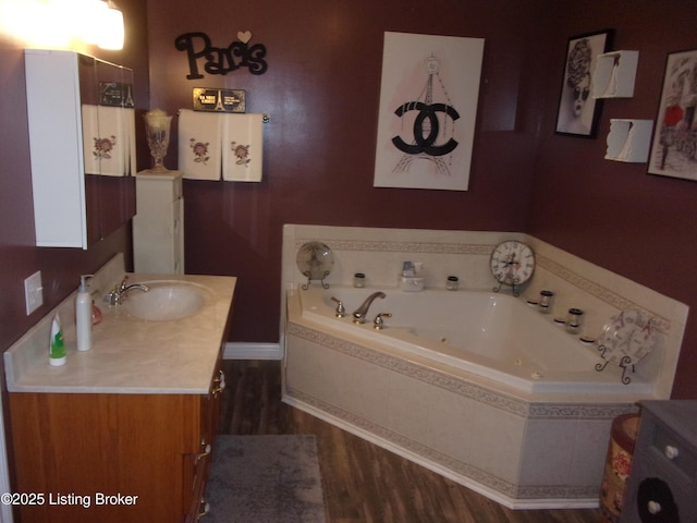 1366 Greens Chapel Rd, Bloomfield, KY 40008 - full bath featuring vanity, wood finished floors, and a whirlpool tub