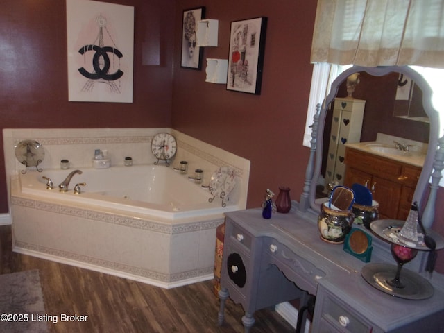 1366 Greens Chapel Rd, Bloomfield, KY 40008 - bathroom with wood finished floors, a bath, and vanity
