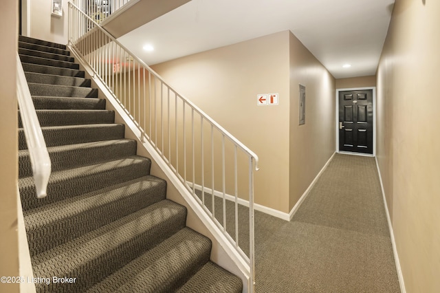 2726 Hollywood Ter Apt 101, Louisville, KY 40206 - staircase featuring carpet floors and recessed lighting