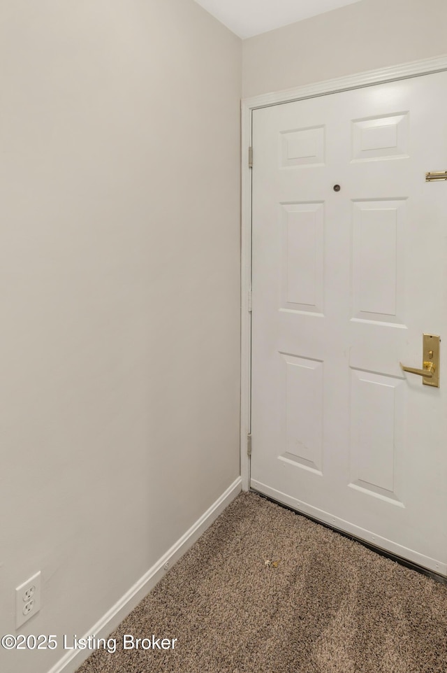 2726 Hollywood Ter Apt 101, Louisville, KY 40206 - doorway to outside featuring baseboards and carpet flooring