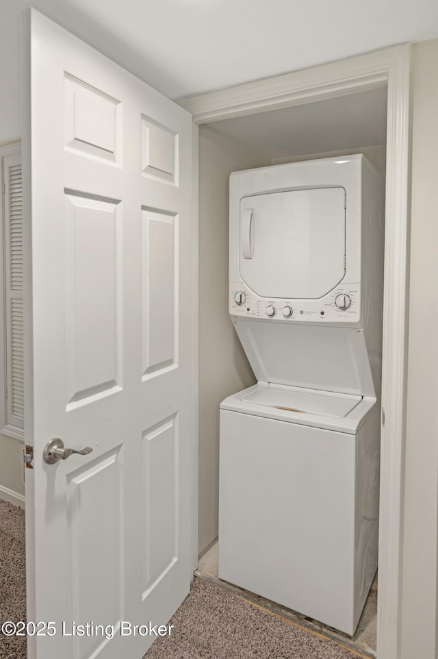 2726 Hollywood Ter Apt 101, Louisville, KY 40206 - laundry area with stacked washing machine and dryer