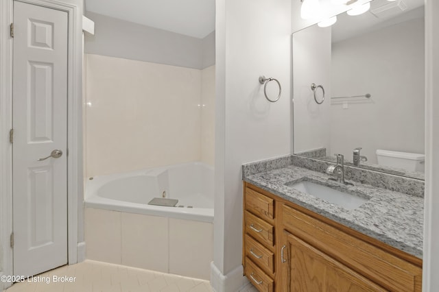 2726 Hollywood Ter Apt 101, Louisville, KY 40206 - full bathroom featuring a jetted tub, vanity, and tile patterned flooring