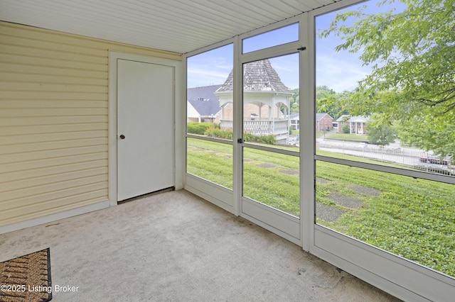 2726 Hollywood Ter Apt 101, Louisville, KY 40206 - unfurnished sunroom featuring carpet floors