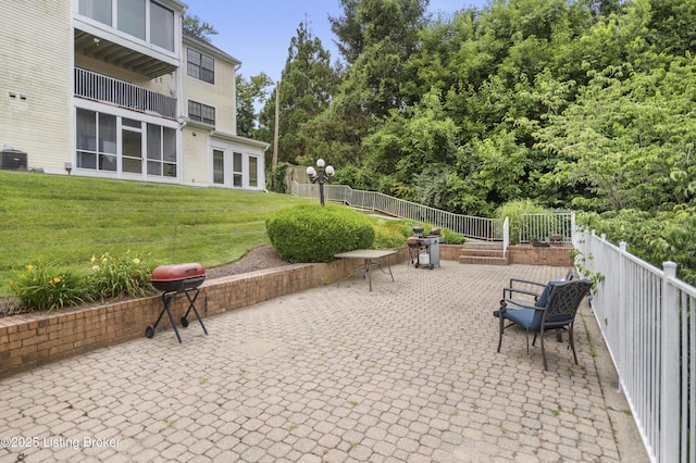 2726 Hollywood Ter Apt 101, Louisville, KY 40206 - fenced backyard with a patio area and grilling area