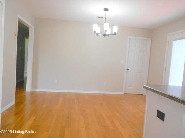 732 Poplar Flat Rd, Bardstown, KY 40004 - unfurnished dining area featuring a chandelier and light wood-style flooring