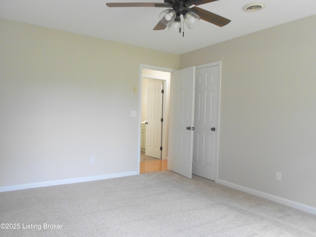 732 Poplar Flat Rd, Bardstown, KY 40004 - unfurnished bedroom with light carpet, a closet, and ceiling fan