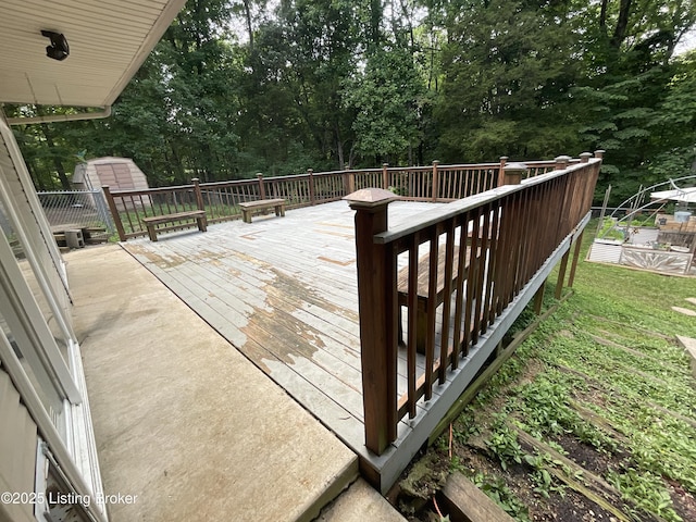 40 Sunflower Ln, Brandenburg, KY 40108 - wooden deck featuring a shed and view of wooded area