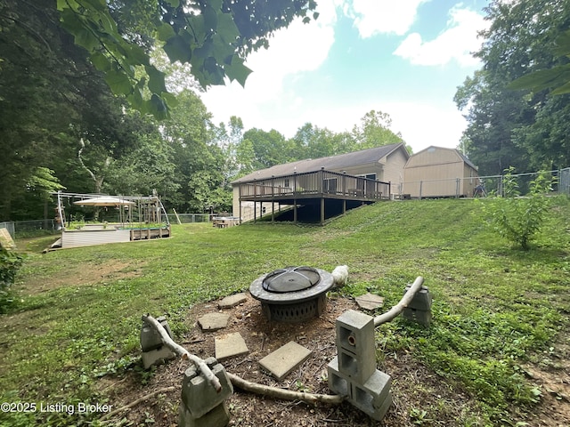 40 Sunflower Ln, Brandenburg, KY 40108 - view of yard with a fire pit and a wooden deck