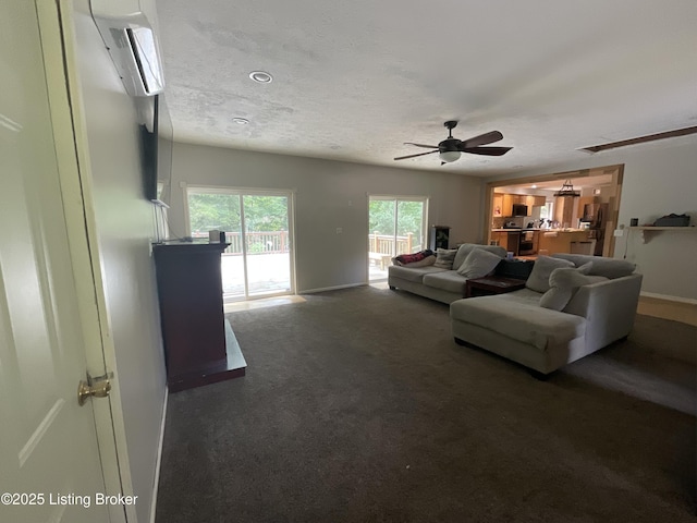 40 Sunflower Ln, Brandenburg, KY 40108 - living room featuring a ceiling fan, carpet, and a wall unit AC