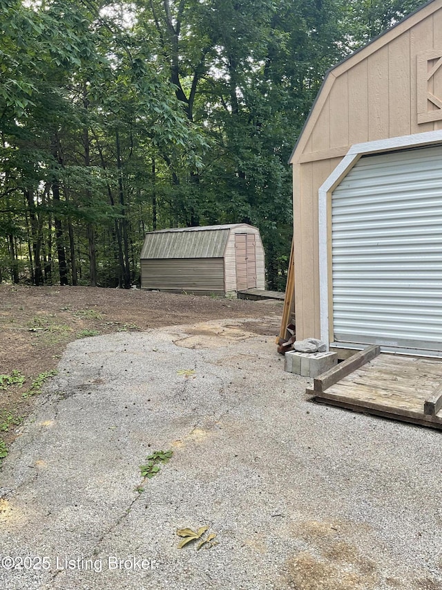 40 Sunflower Ln, Brandenburg, KY 40108 - garage with a storage unit