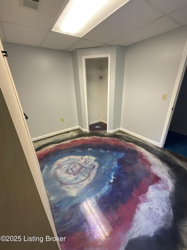 40 Sunflower Ln, Brandenburg, KY 40108 - empty room featuring a drop ceiling and baseboards