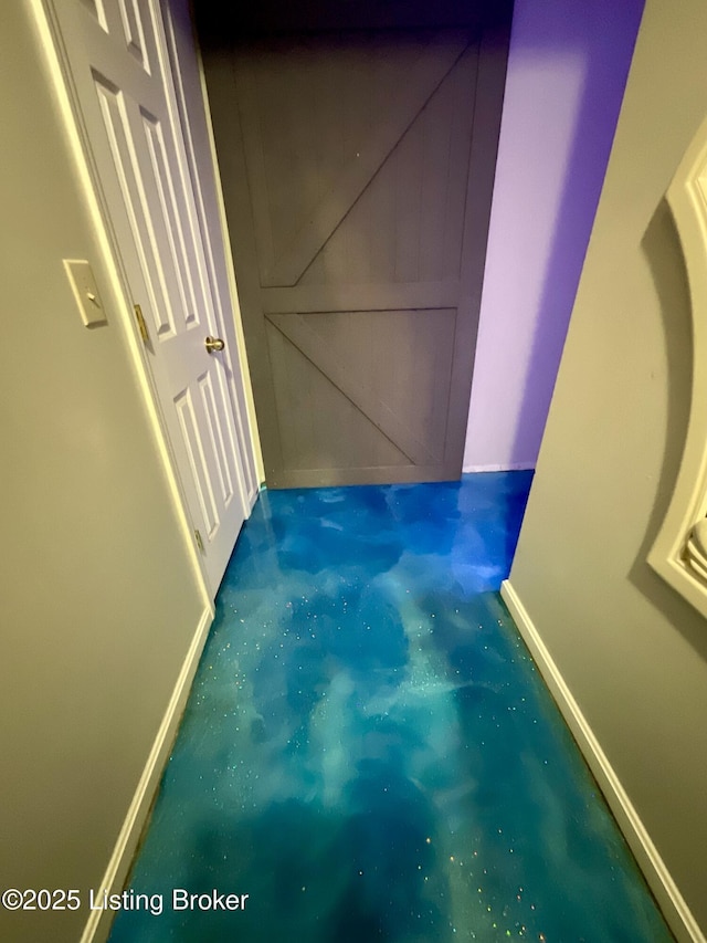 40 Sunflower Ln, Brandenburg, KY 40108 - hallway featuring finished concrete flooring and baseboards