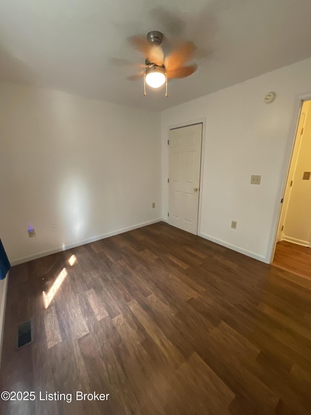 40 Sunflower Ln, Brandenburg, KY 40108 - spare room with ceiling fan and dark wood-type flooring