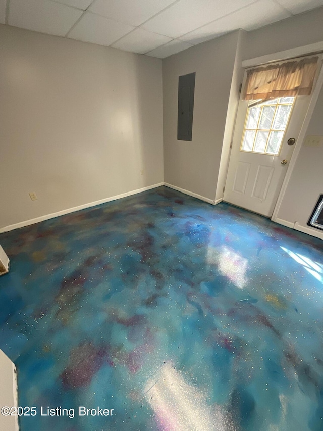 40 Sunflower Ln, Brandenburg, KY 40108 - unfurnished room featuring concrete flooring, electric panel, and a drop ceiling
