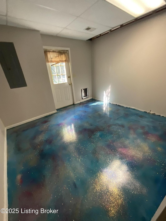 40 Sunflower Ln, Brandenburg, KY 40108 - spare room with concrete floors and a paneled ceiling