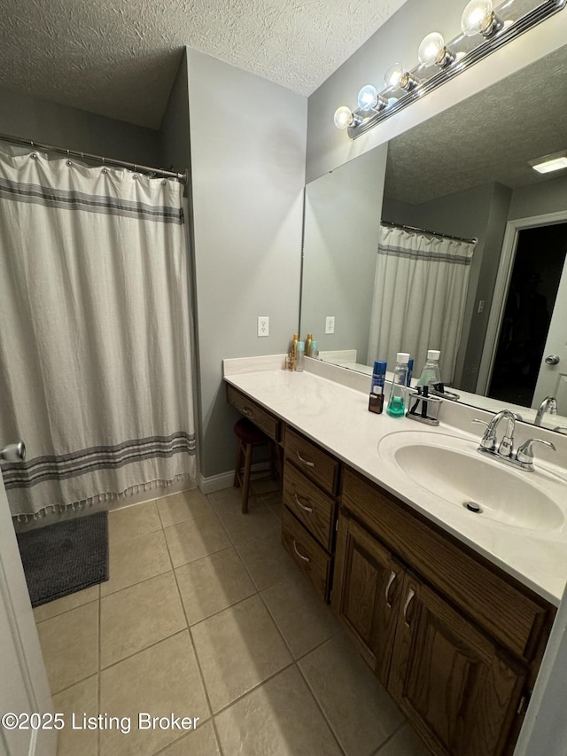 79 Brightberry Rd, Brandenburg, KY 40108 - full bathroom with a textured ceiling, tile patterned floors, vanity, and a shower with curtain