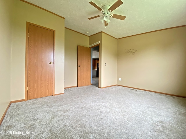 356 Armes Lively Rd, Leitchfield, KY 42754 - unfurnished bedroom featuring carpet floors, crown molding, a ceiling fan, and a textured ceiling