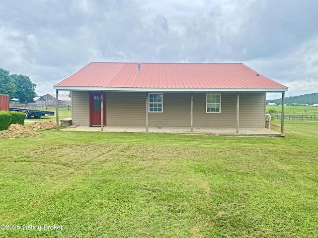 356 Armes Lively Rd, Leitchfield, KY 42754 - back of property featuring a metal roof and a patio area