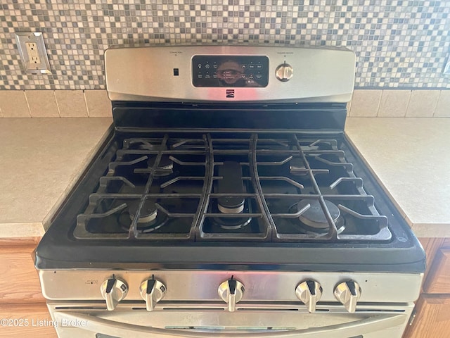 356 Armes Lively Rd, Leitchfield, KY 42754 - kitchen view of stainless steel gas stove and backsplash
