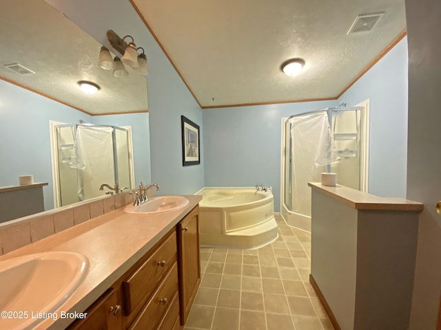 356 Armes Lively Rd, Leitchfield, KY 42754 - bathroom featuring a shower stall, ornamental molding, a bath, tile patterned flooring, and a textured ceiling